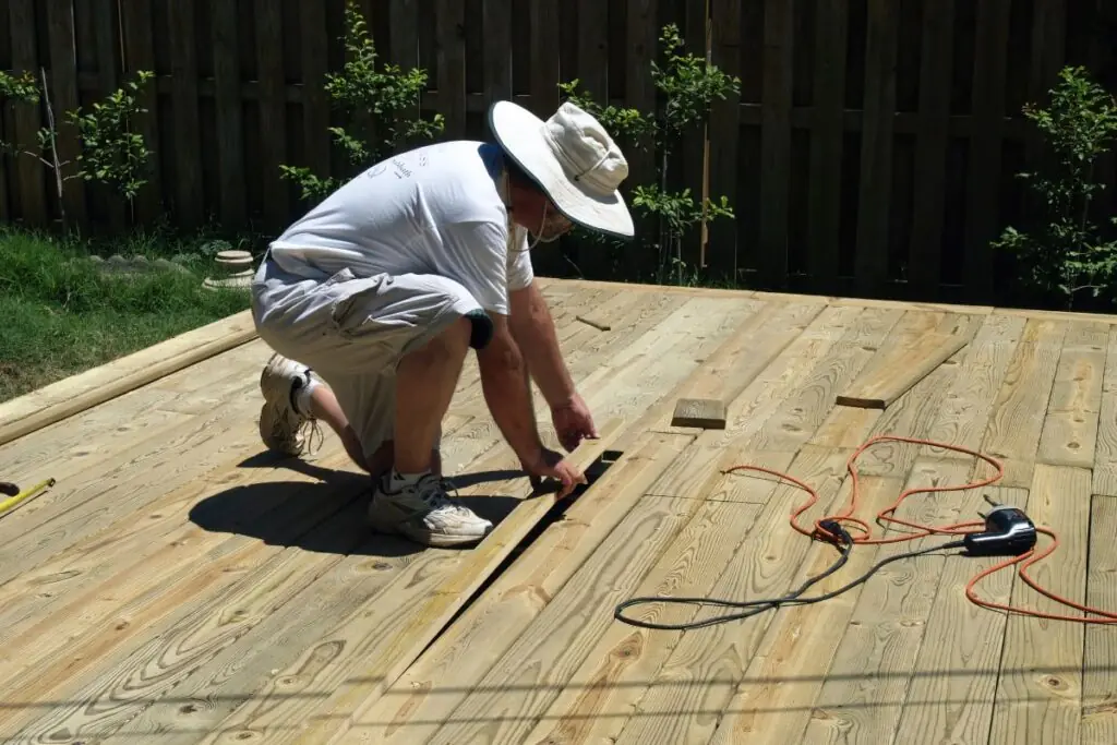 backyard deck contractors finishing plank